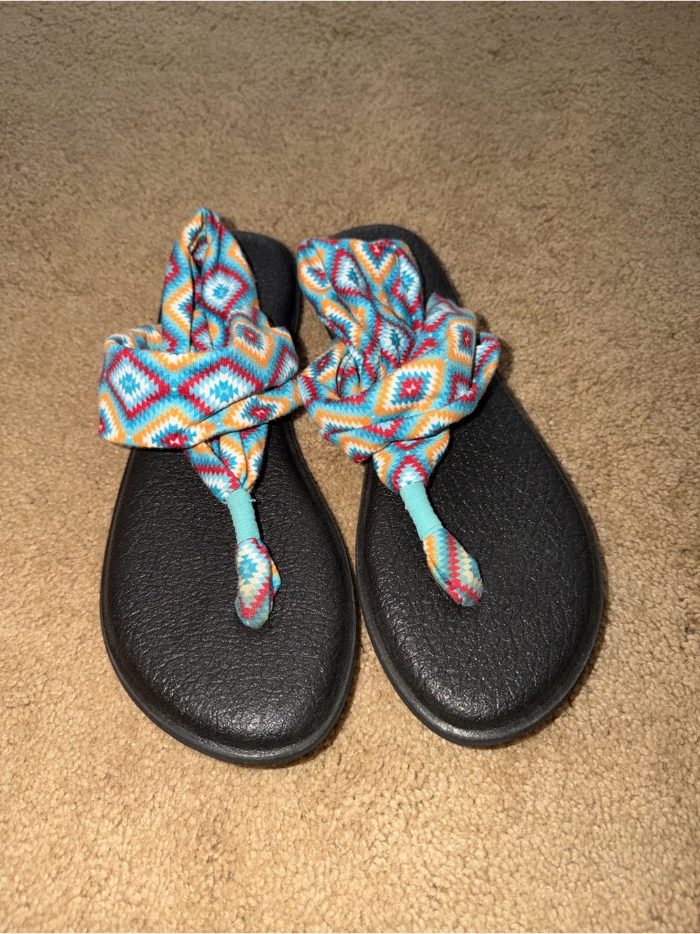 Sanuk Black Sandals with Turquoise, Orange & Red Patterned Straps